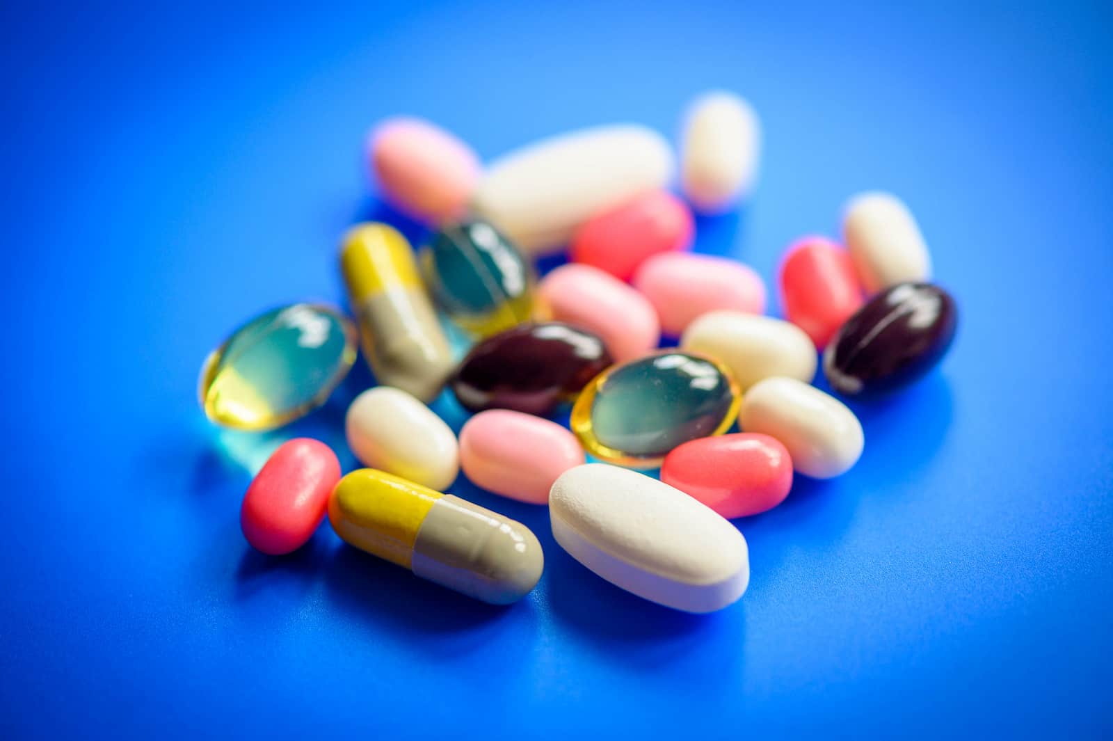 several pills including soft gels, capsules, and tablets